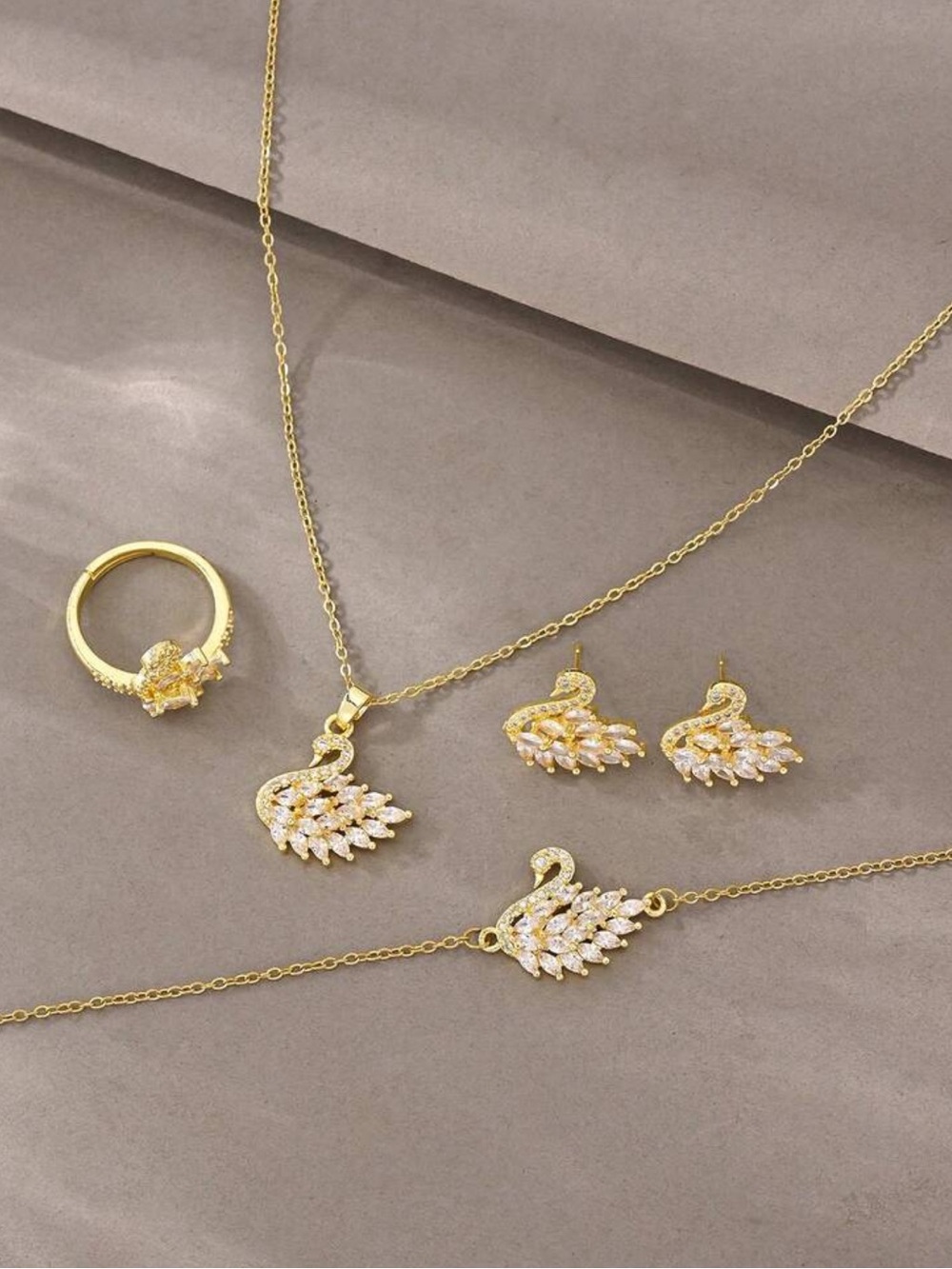 Kohl's Gold Swan Jewelry Set with Clear Stones